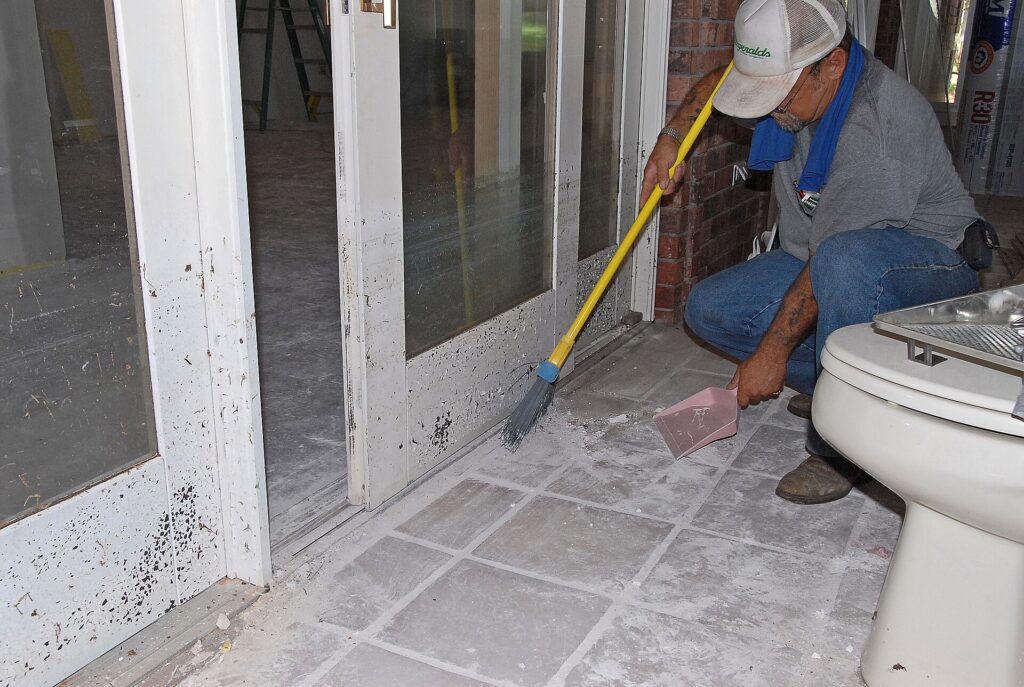 Cleanup after flood water damage inside a home